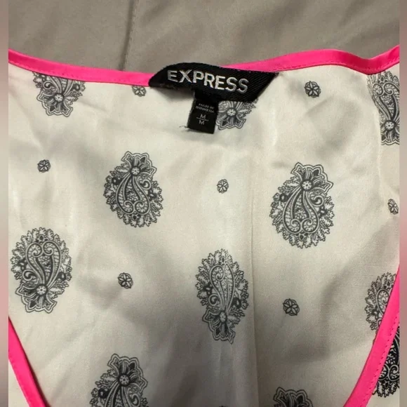 Express v-neck blouse with pretty pink trim, blouse is white with black design. - Picture 6 of 9
